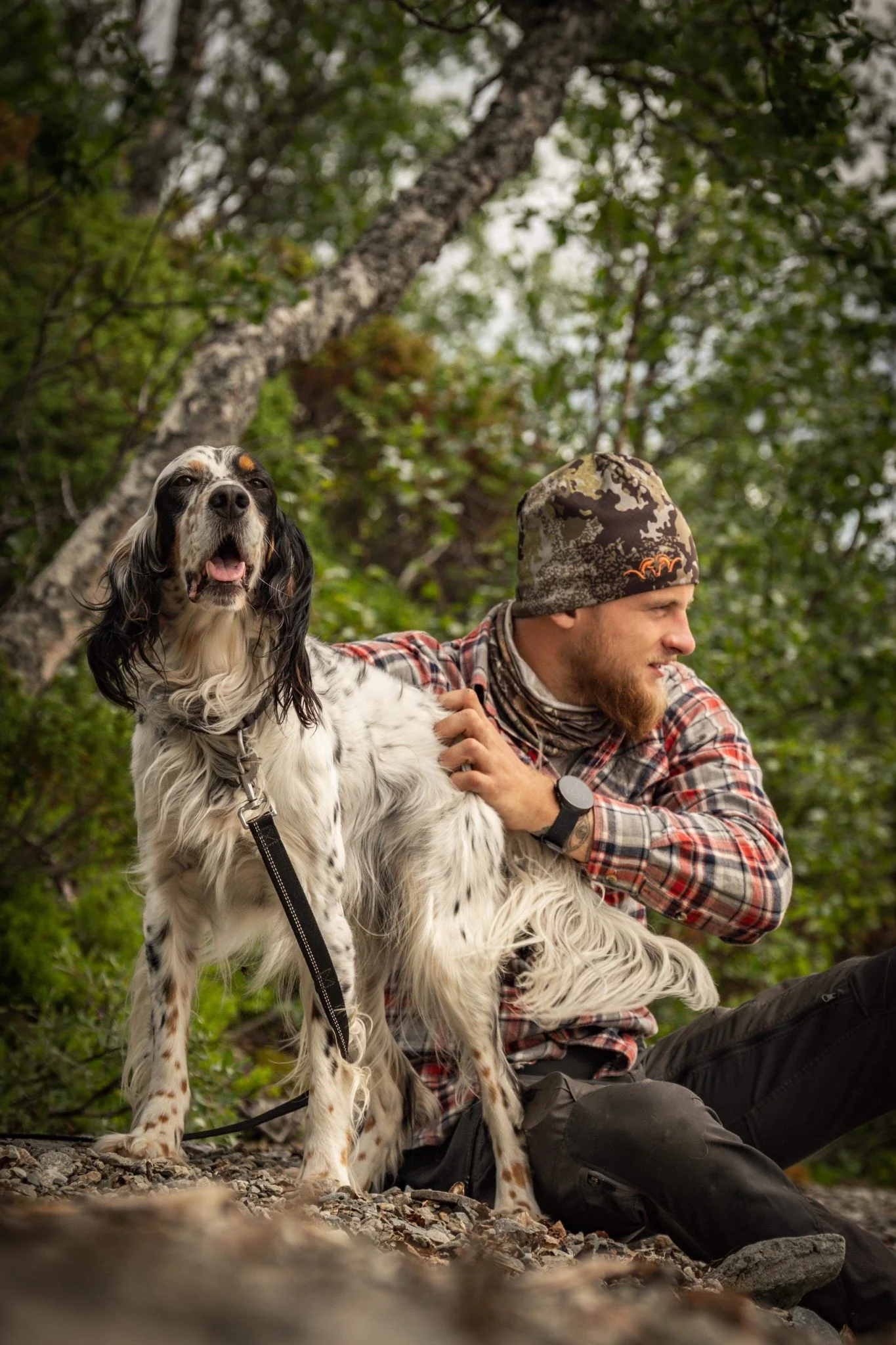 Iver outdoors with his dog